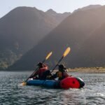 a group of people in a canoe