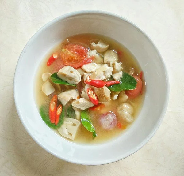 Vegetarian Tom Yum soup made with fresh mushrooms and aromatic herbs.